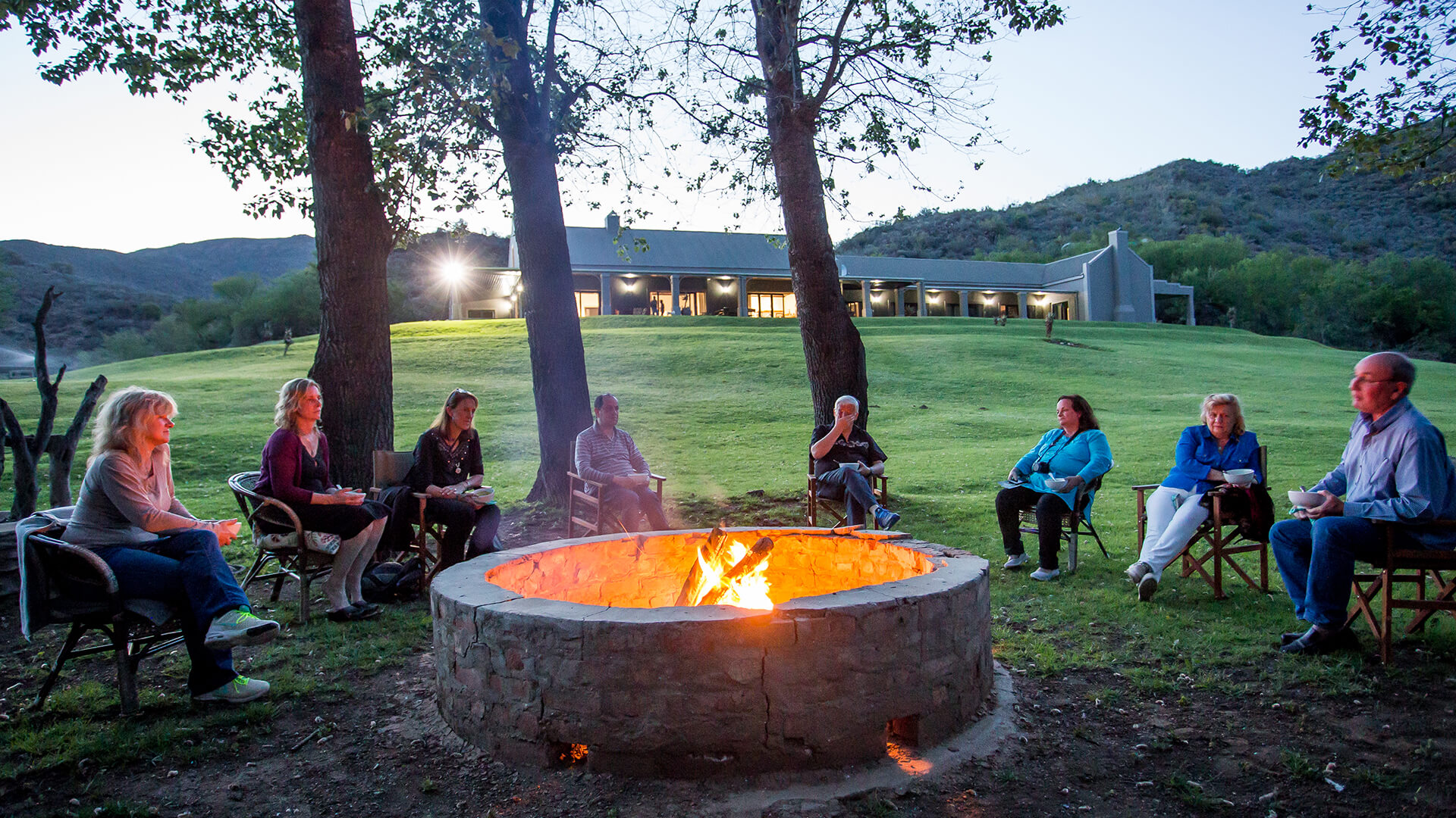 Guests Sitting Around a Bonfire Wildehondekloof